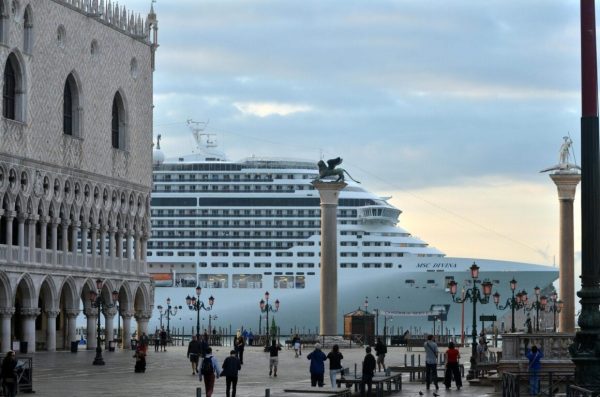 epa05427779 (FILE) The file picture dated 21 September 2013 shows luxury cruise liner 'MSC Divina' passing in front of San Marco Square in Venice, Italy. Media reports on 16 July 2016, that the UNESCO World Heritage Committee has threatened to put Venice on their list of endangered heritage sites on 14 July 2016, if authorities fail to ban big cruise liner from the lagoon by 2017. The 40th World Heritage Committee meets in Istanbul from 10 to 20 July 2016.  EPA/ANDREA MEROLA