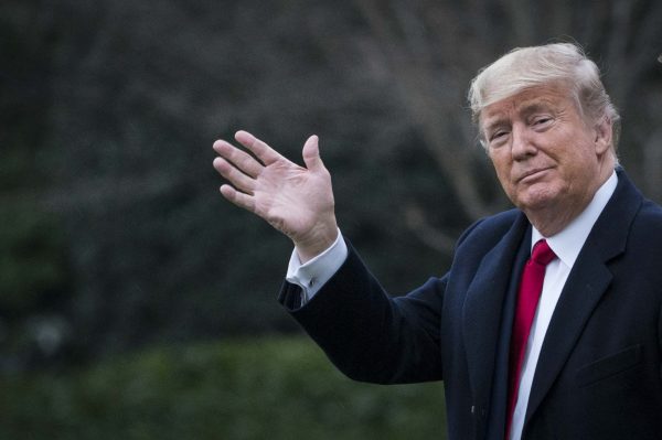 WASHINGTON, DC - JANUARY 31: U.S. President Donald Trump and First Lady Melania Trump walk along the South Lawn to Marine One as they depart from the White House for a weekend trip to Mar-a-Lago on January 31, 2020 in Washington, DC. Senators are expected to debate and then vote on whether to include additional witnesses and documents today in the Senate impeachment trial of President Trump. (Photo by Sarah Silbiger/Getty Images)